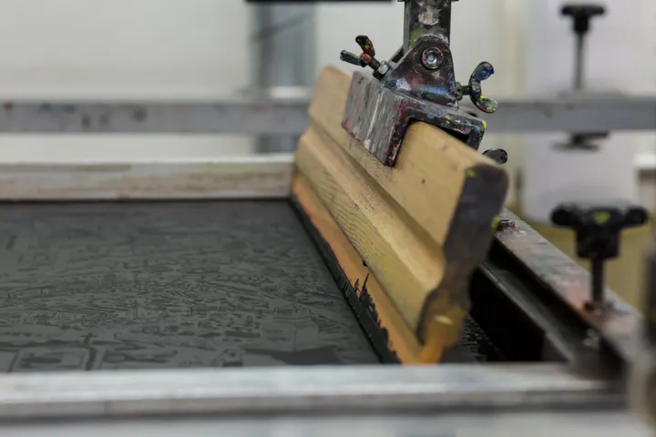 Screen printing equipment and squeegee detail without people
